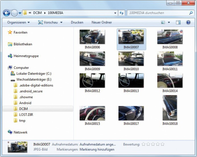 Im Windows-Explorer greifen Sie auf den Telefonspeicher zu und kopieren beispielsweise Fotos auf die Festplatte.