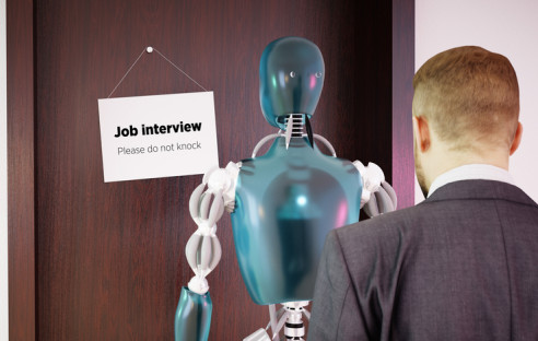 Man waiting in line with robot for job interview