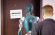 Man waiting in line with robot for job interview