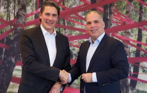 Uwe Nickl, CEO von Deutsche Glasfaser (links) und Dirk Wössner, Vorstand Telekom Deutschland