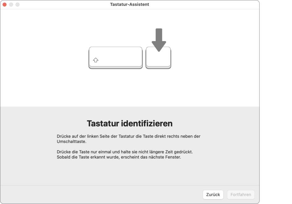 Der Screenshot zeigt den Assistenten von macOS, der versucht, den Typ der Tastatur zu ermitteln