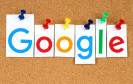 Google Logo auf Pinnwand