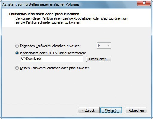 Partition einbinden: Hier wird eine neue Partition nicht als Laufwerk „F:“ erstellt, sondern als Ordner „C:\Downloads“ (Bild 3).